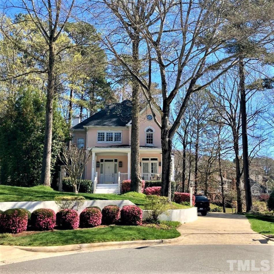 7600 Pinewild Court Raleigh, NC 27615 - Photo 3 of 52 a front view of building with yard
