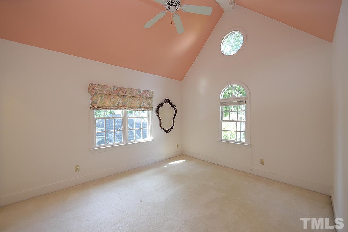 7600 Pinewild Court Raleigh, NC 27615 - Photo 33 of 52 a view of an empty room with a window
