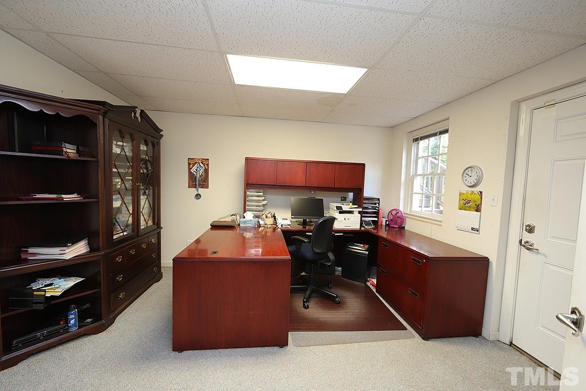 7600 Pinewild Court Raleigh, NC 27615 - Photo 41 of 52 a view of a workspace with furniture