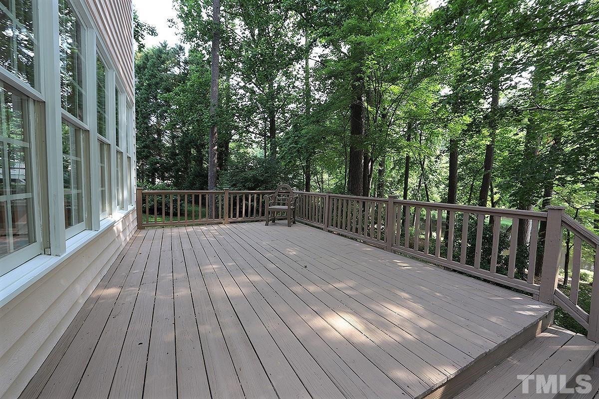 7600 Pinewild Court Raleigh, NC 27615 - Photo 45 of 52 a view of deck with wooden floor and outdoor space
