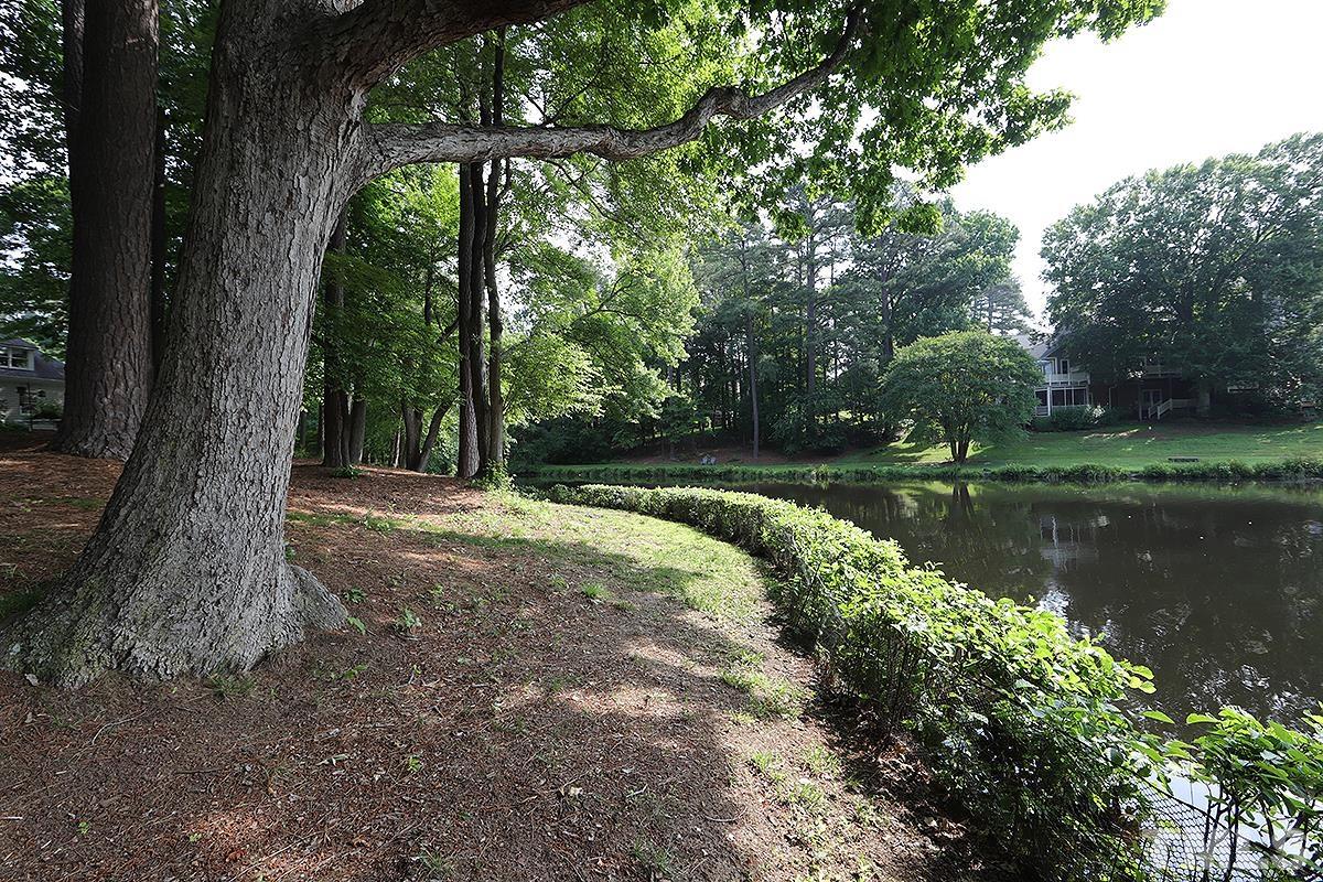 7600 Pinewild Court Raleigh, NC 27615 - Photo 48 of 52 a view of a lake view