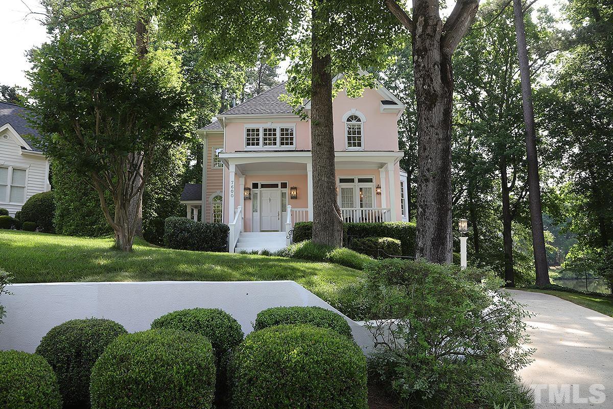 7600 Pinewild Court Raleigh, NC 27615 - Photo 6 of 52 a front view of a house with garden