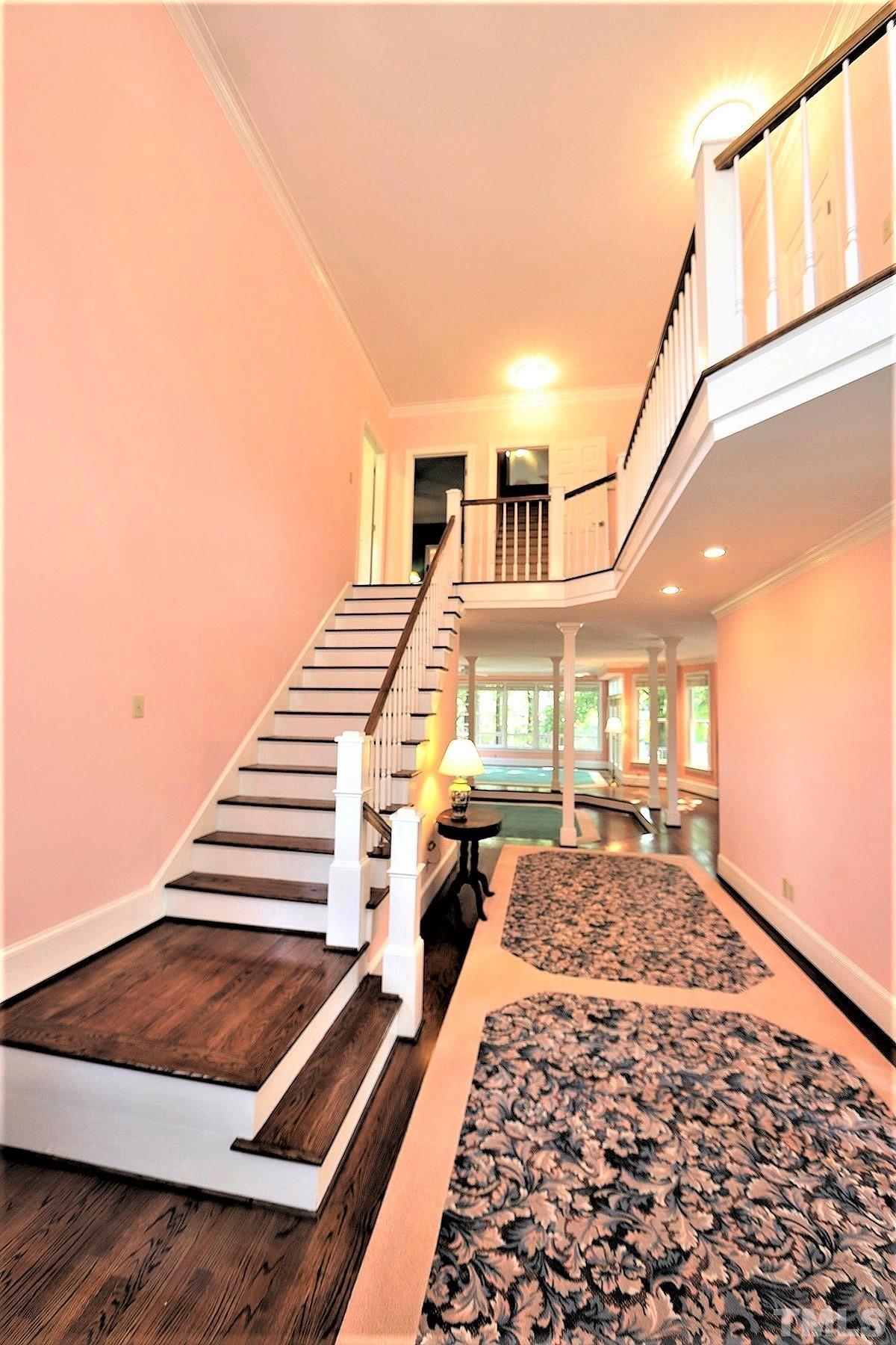 7600 Pinewild Court Raleigh, NC 27615 - Photo 8 of 52 a very nice looking room with a large window