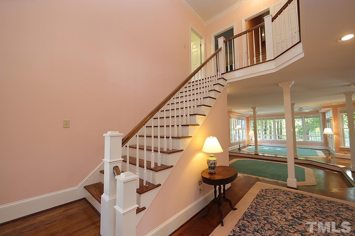 7600 Pinewild Court Raleigh, NC 27615 - Photo 9 of 52 a view of entryway with a front door