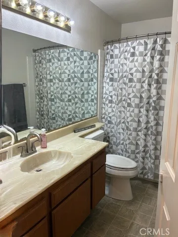 a livingroom with furniture and window