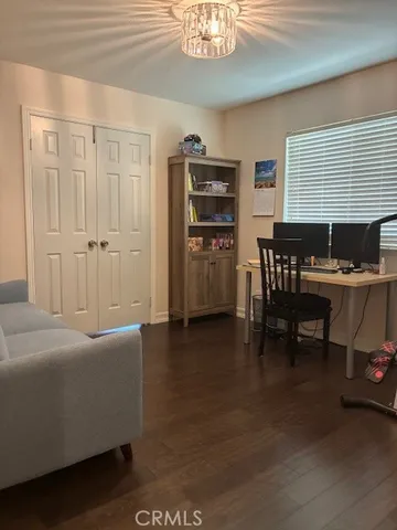 a room with furniture and a wooden floor