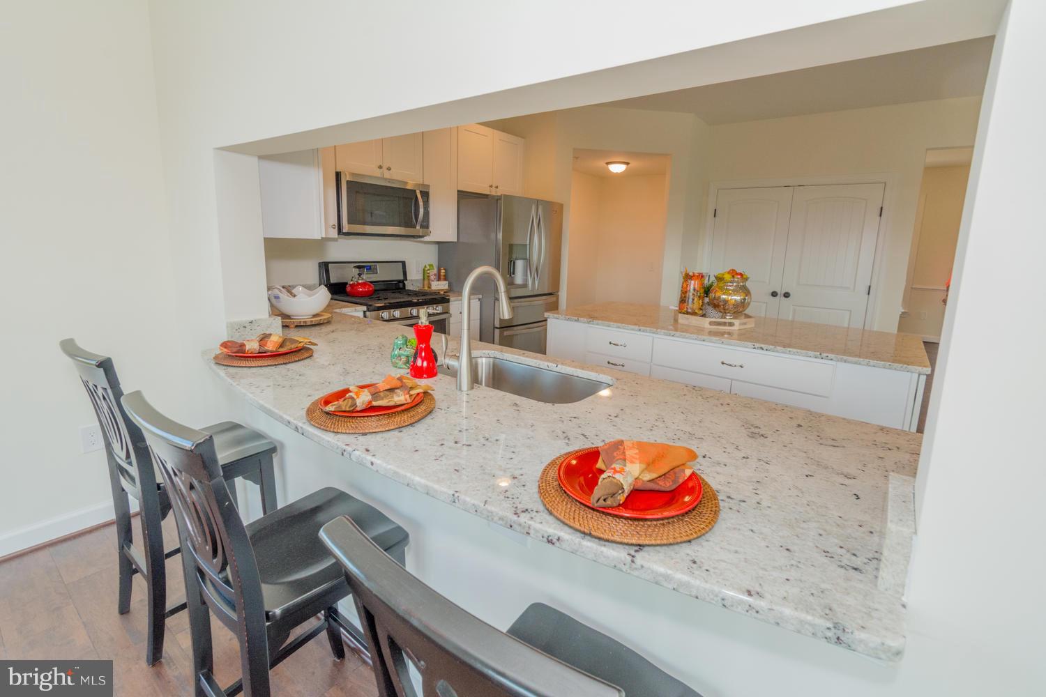 25 Holy Cross Road Street, MD 21154 - Photo 9 of 30 Granite Breakfast Bar