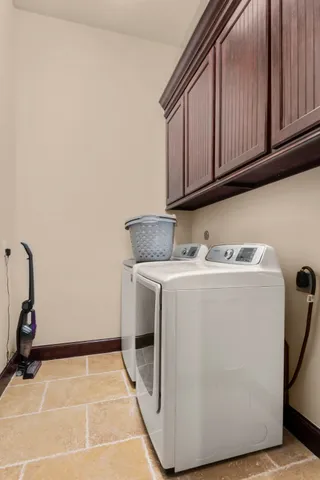 a backyard of a house with outdoor seating