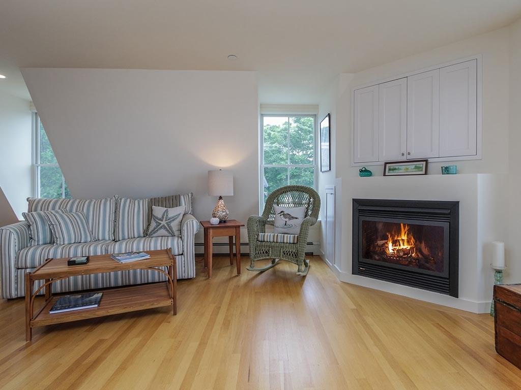 6 Merritt House Road, Unit 32 Harpswell, ME 04066 - Photo 6 of 18 The fireplace keeps the place cozy...