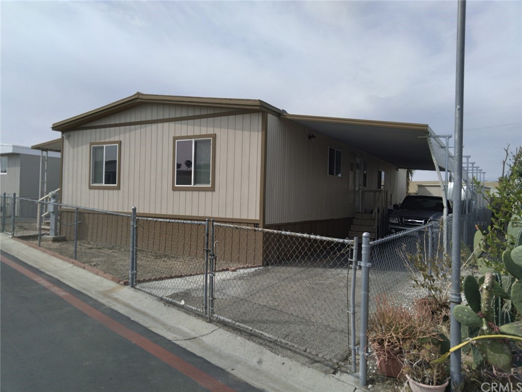 2930 Rialto, Unit 16 Rialto, CA 92376 - Photo 1 of 1 a backyard of a house