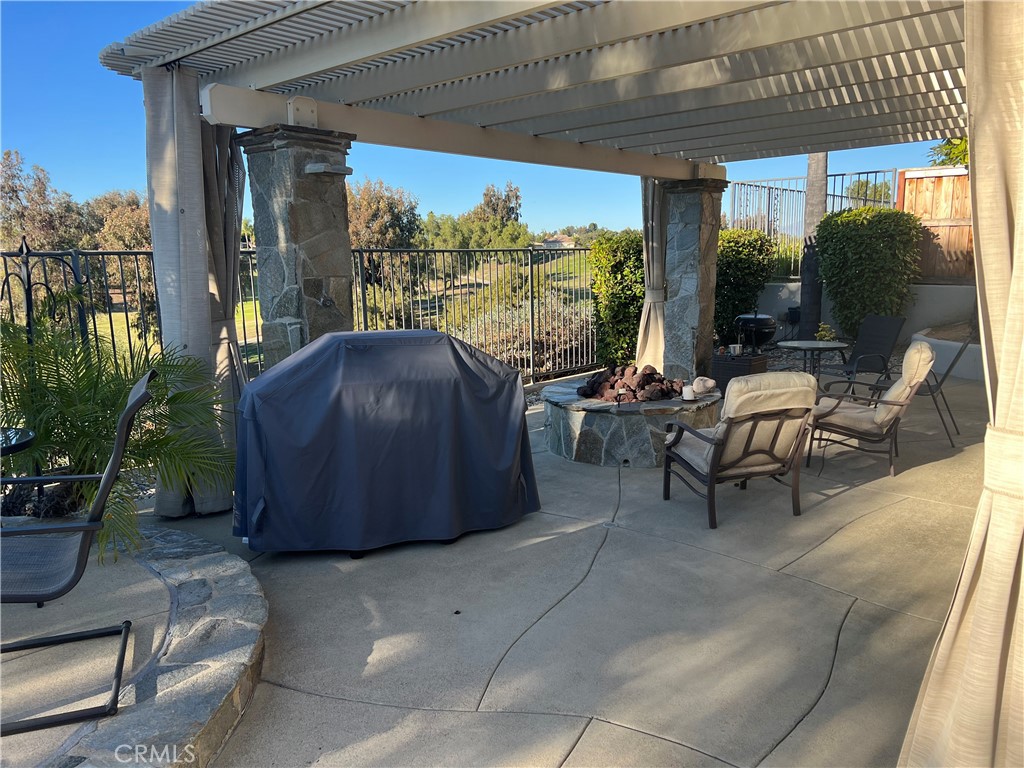 31458 Inverness Court Temecula, CA 92591 - Photo 17 of 33 a building outdoor space with patio furniture and potted plants