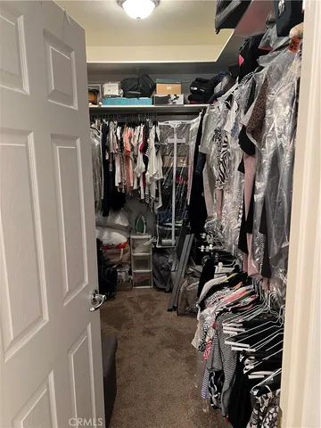 a living room with furniture and window