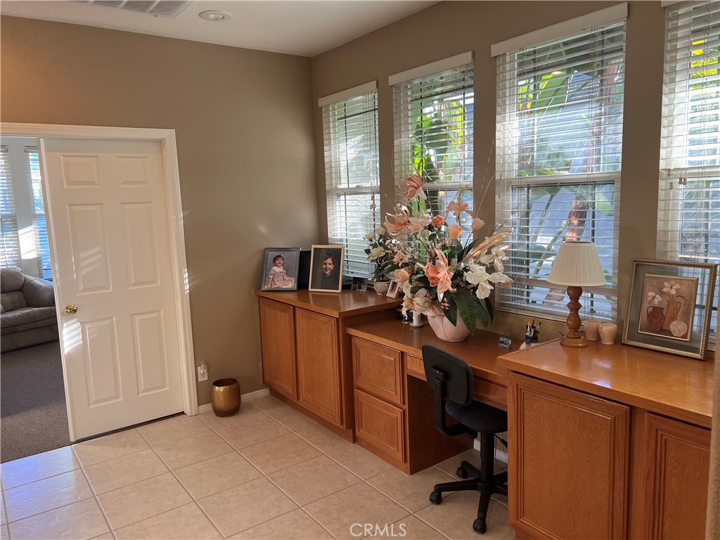 31458 Inverness Court Temecula, CA 92591 - Photo 24 of 33 a view of a workspace with furniture and a window