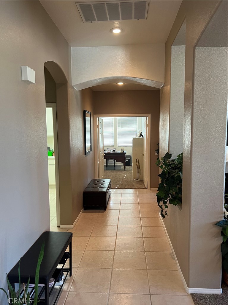 31458 Inverness Court Temecula, CA 92591 - Photo 26 of 33 a lobby with furniture and potted plant