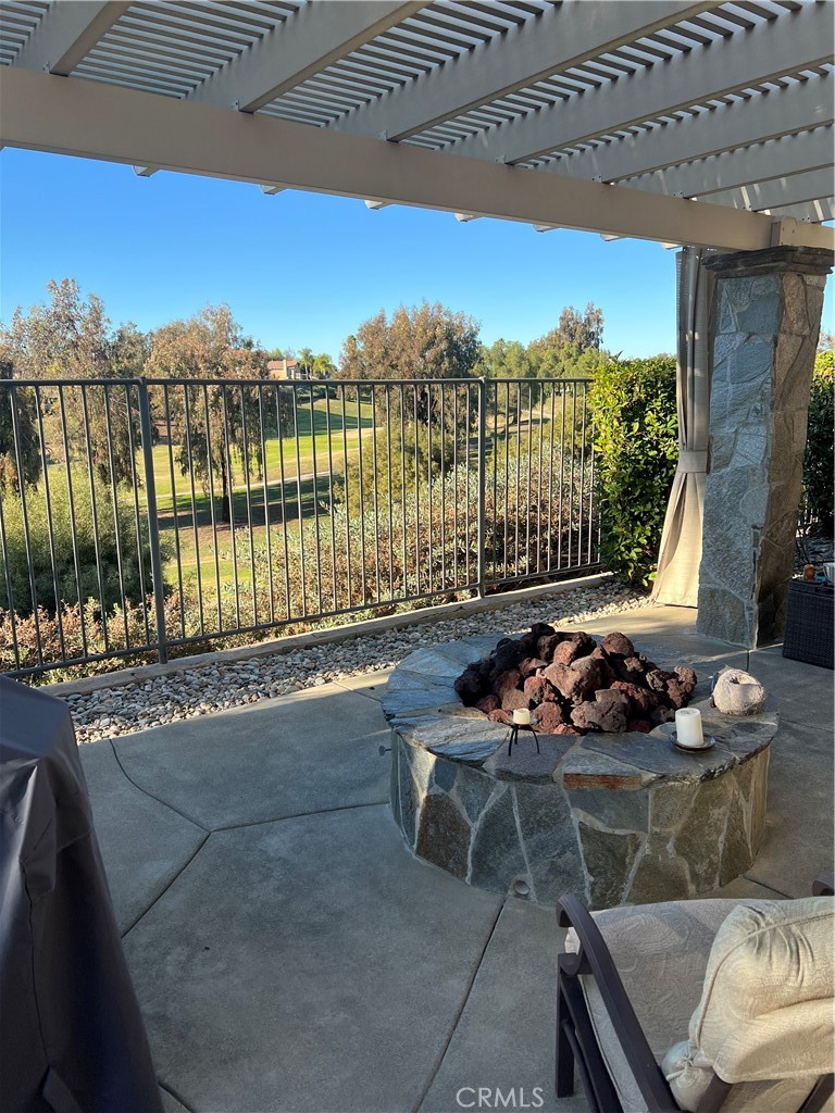 31458 Inverness Court Temecula, CA 92591 - Photo 5 of 33 a table and chairs in a patio