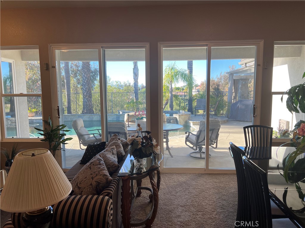 31458 Inverness Court Temecula, CA 92591 - Photo 8 of 33 a living room with furniture and a large window