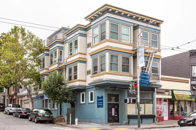 a front view of a building and a street