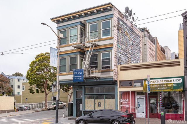 a front view of a building with street