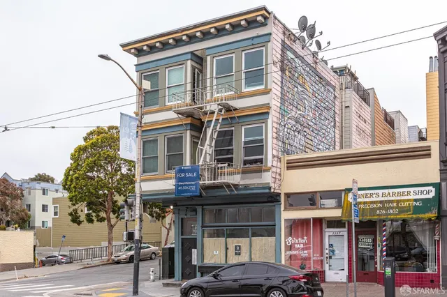 a front view of a building with street