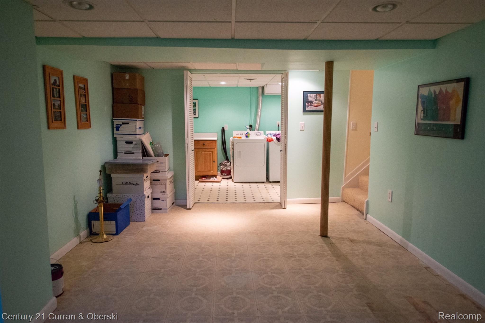 3453 Crooks Road, Unit 21 Royal Oak, MI 48073 - Photo 18 of 24 Finished Basement & Laundry Room