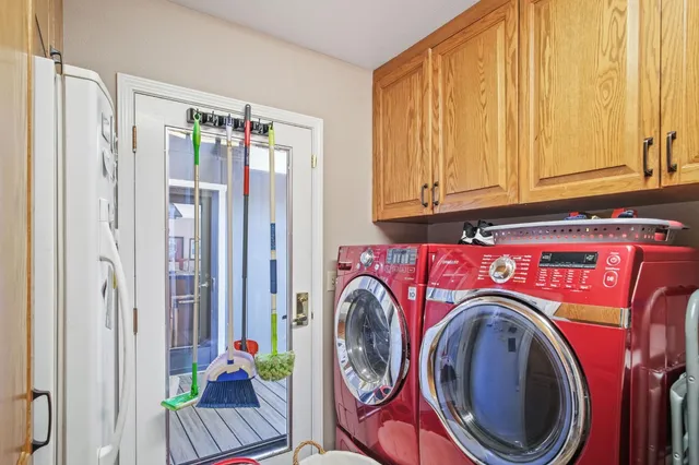 a spacious bathroom with a double vanity sink mirror and double