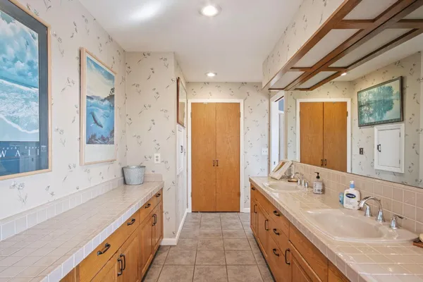 a view of a patio with table and chairs
