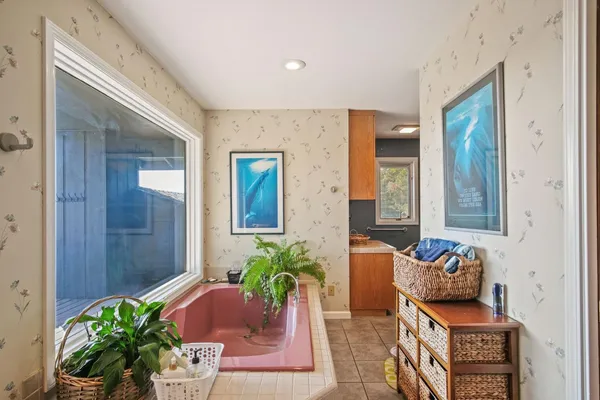 a view of a balcony with wooden floor
