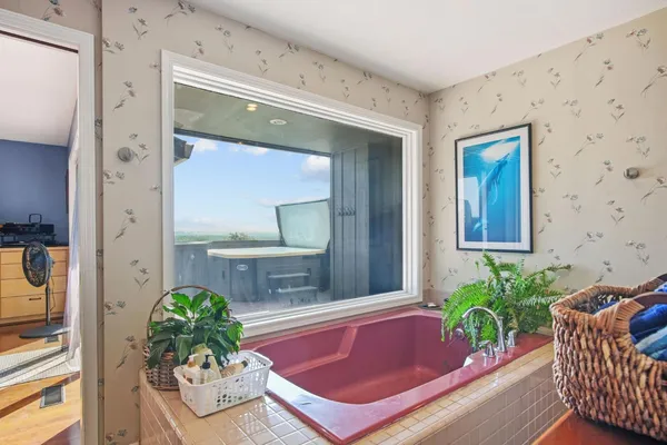 a dining room with a table and chairs