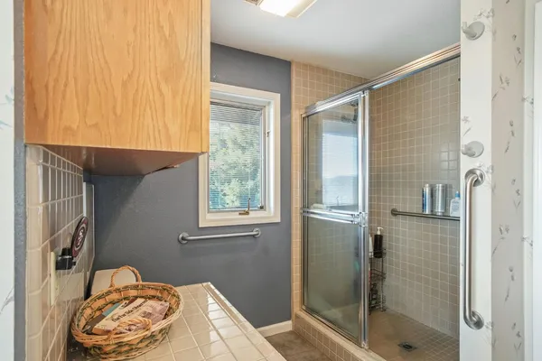 a view of a chair and table in the balcony