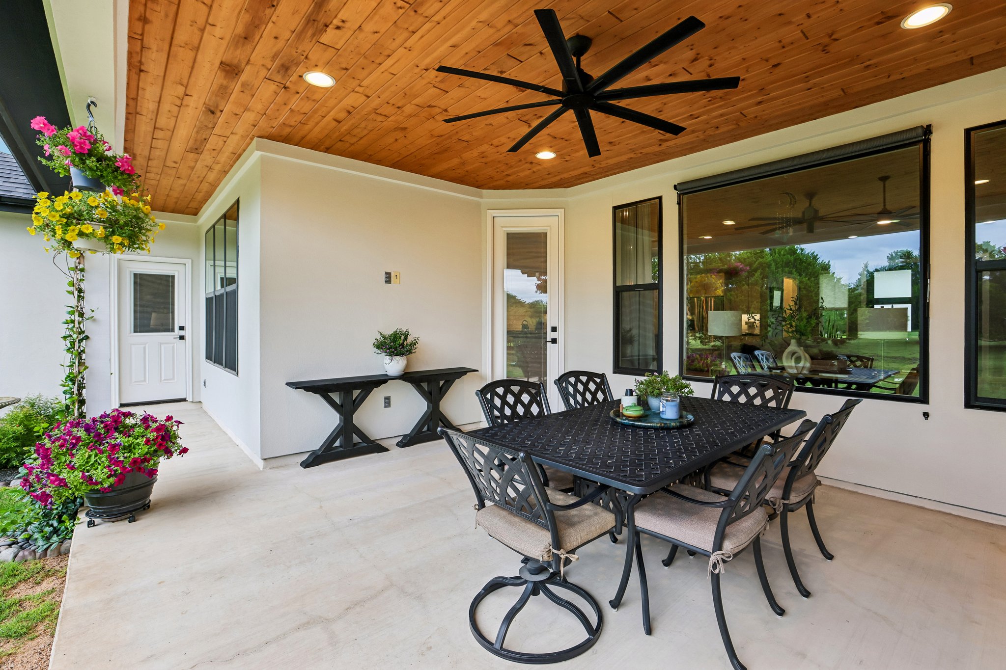 113 Crystal Lane Georgetown, TX 78633 - Photo 31 of 32 A spacious covered patio invites al fresco dining and relaxed entertaining under a handsome wood plank ceiling.