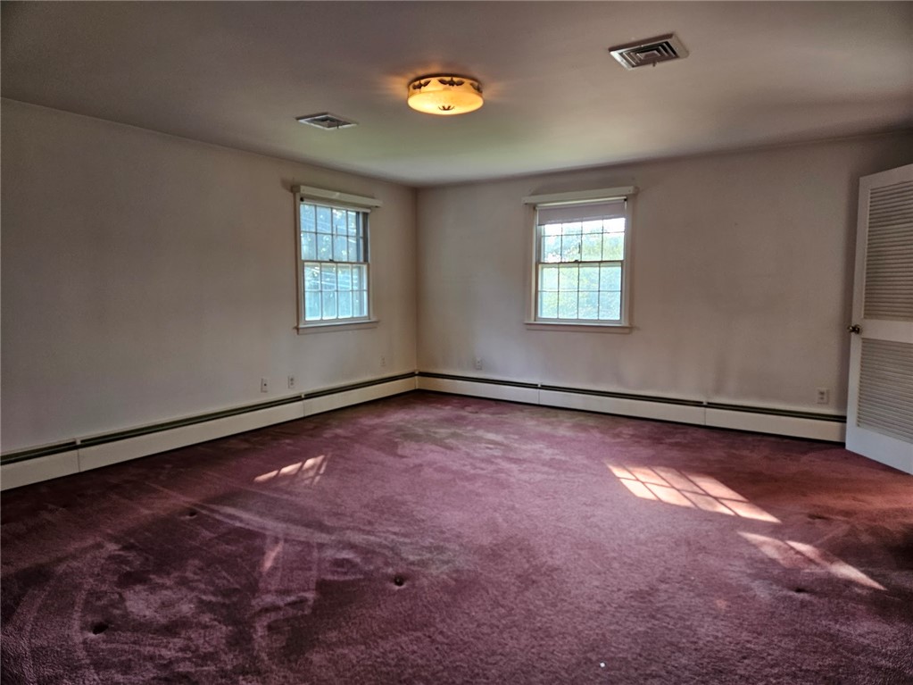 74 West Blue Ridge Road Cranston, RI 02920 - Photo 21 of 37 Hardwoods under carpeting
1