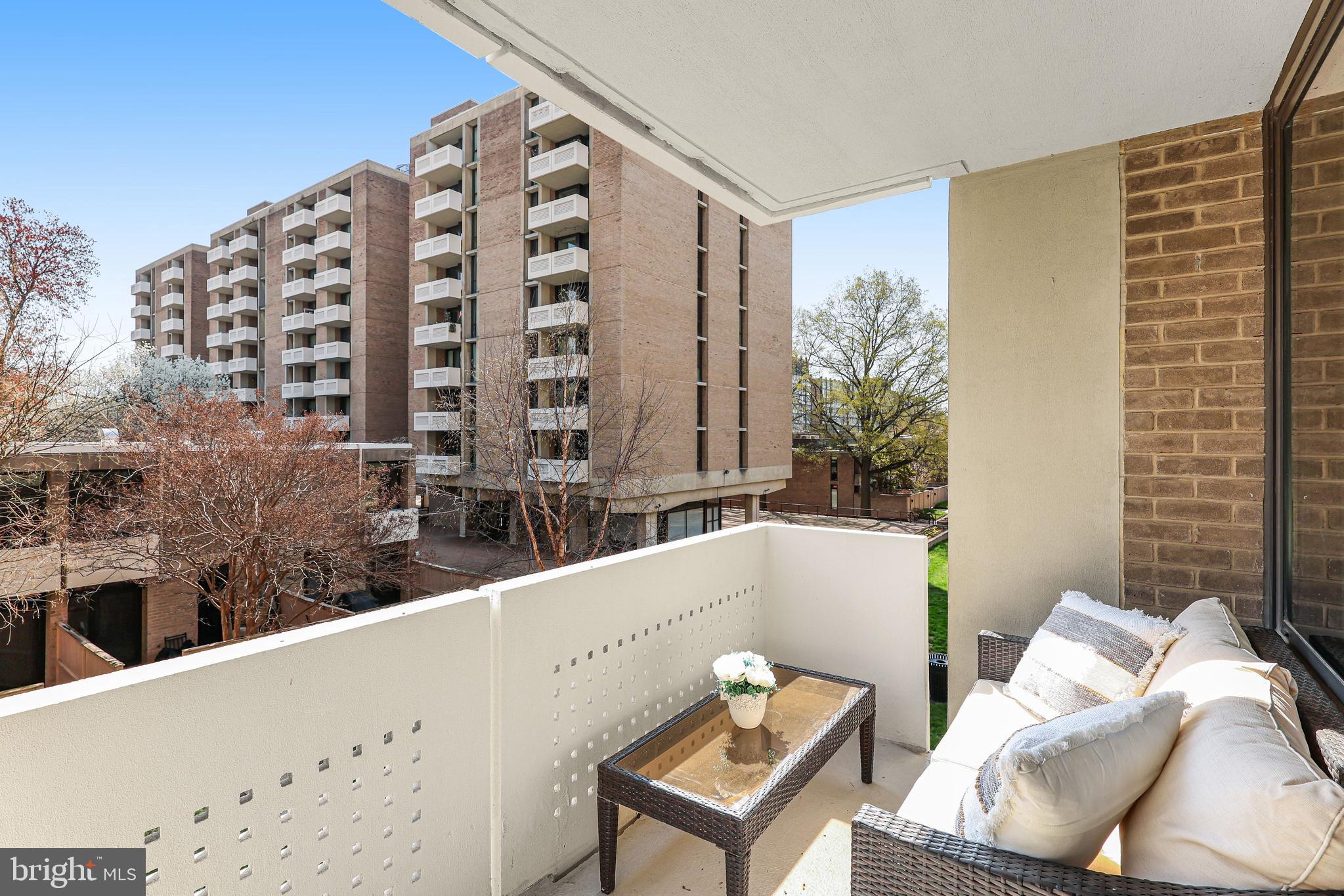 300 M Street Southwest, Unit N102 Washington, DC 20024 - Photo 11 of 53 a view of balcony with couch and potted plant