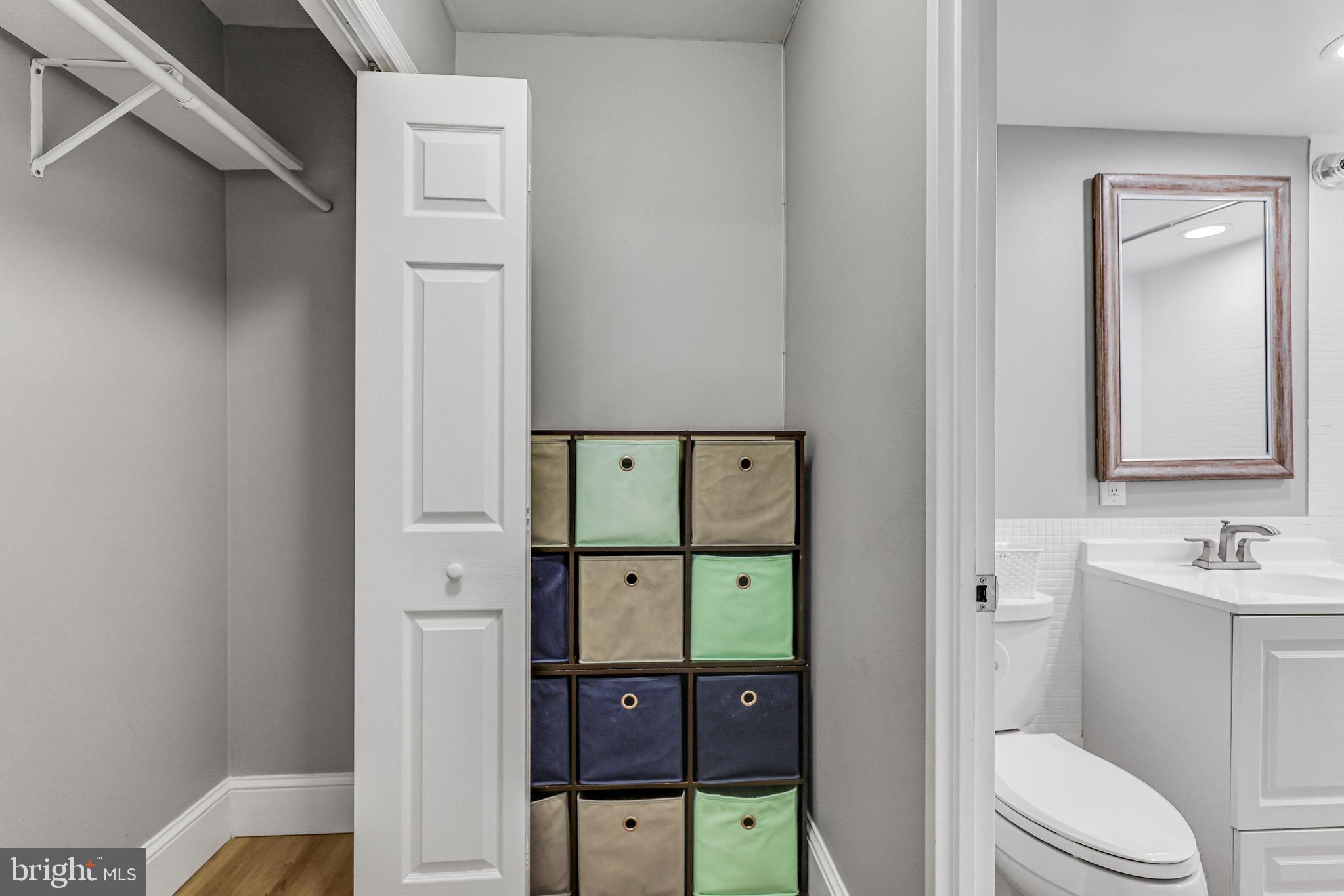 300 M Street Southwest, Unit N102 Washington, DC 20024 - Photo 20 of 53 a bathroom with a toilet a sink and shower