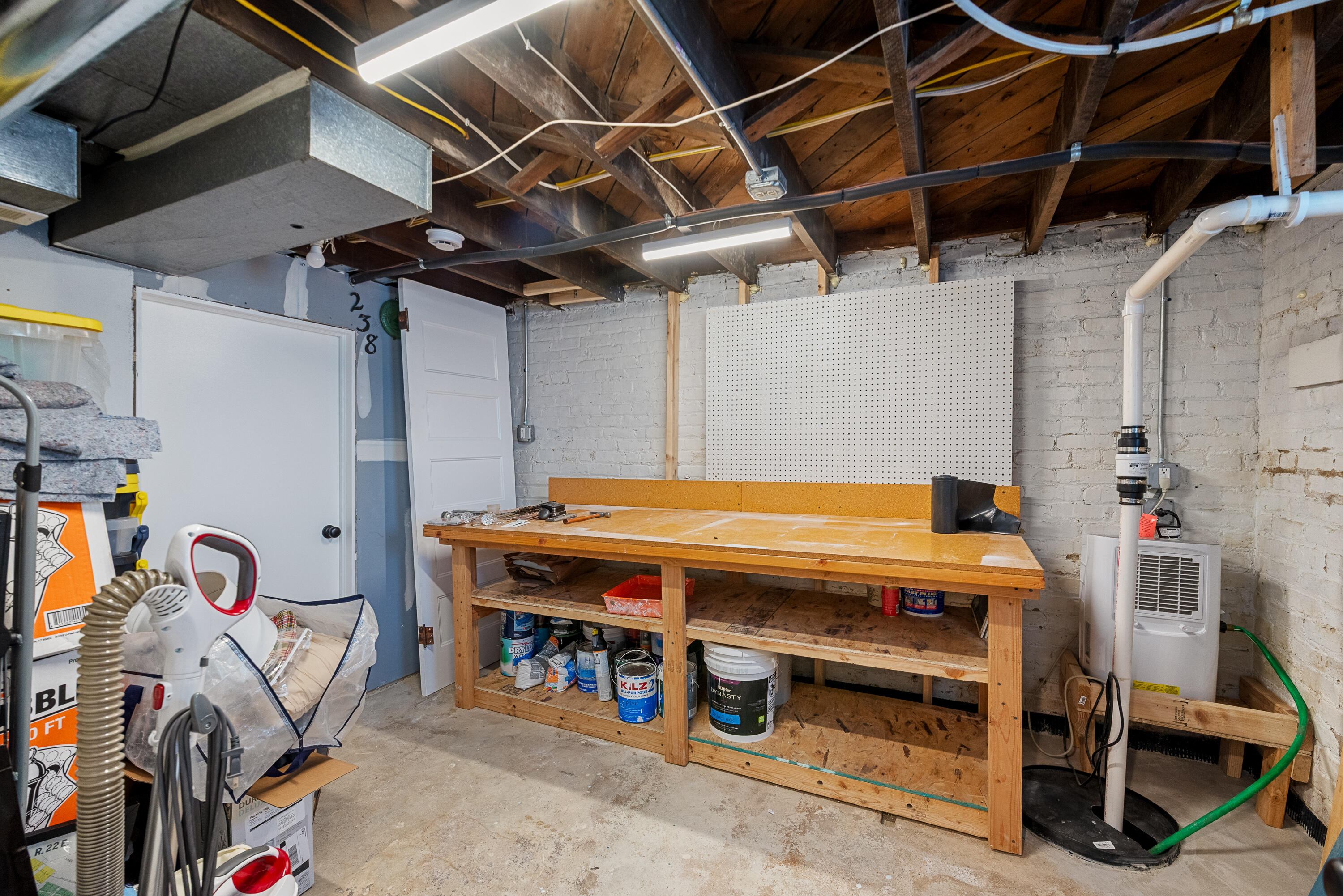 1926 East Bennett Avenue Milwaukee, WI 53207 - Photo 41 of 56 Work Bench & Sump Pump