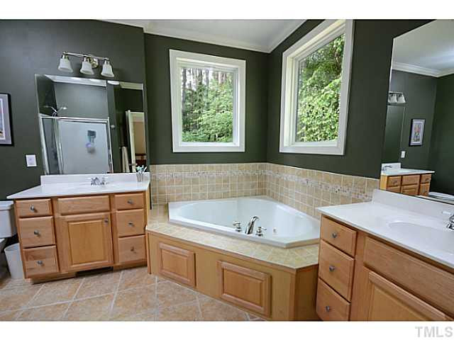 1815 Shaw Road Durham, NC 27704 - Photo 12 of 24 Master bath with dual vanity. Large shower. Upgraded tile throughout the bath. Master Bath/Spa