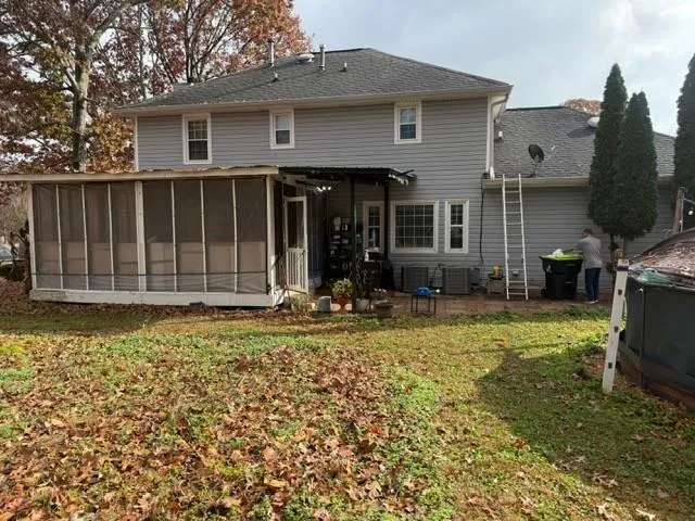 a view of a house with backyard