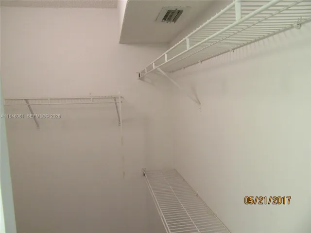a view of a room with racks on the wall