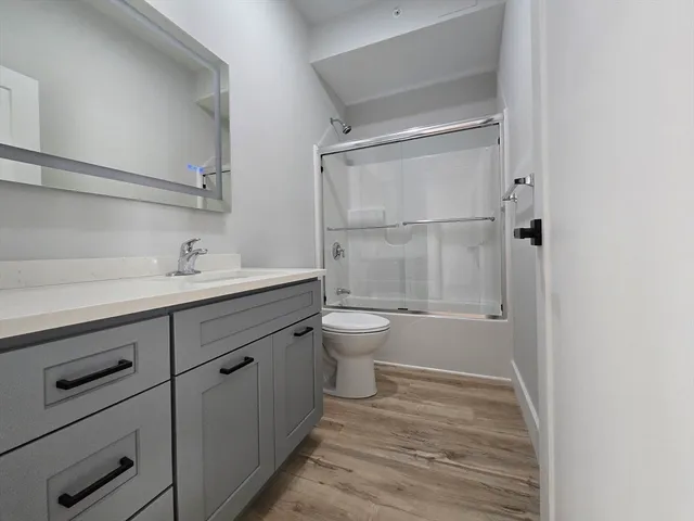 an aerial view of a house with a ocean view