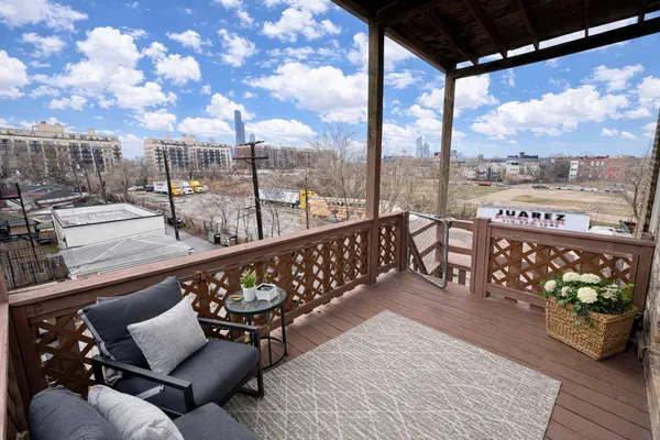 a balcony with furniture