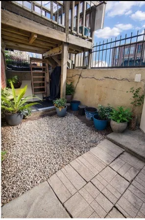 a view of a porch with a bench