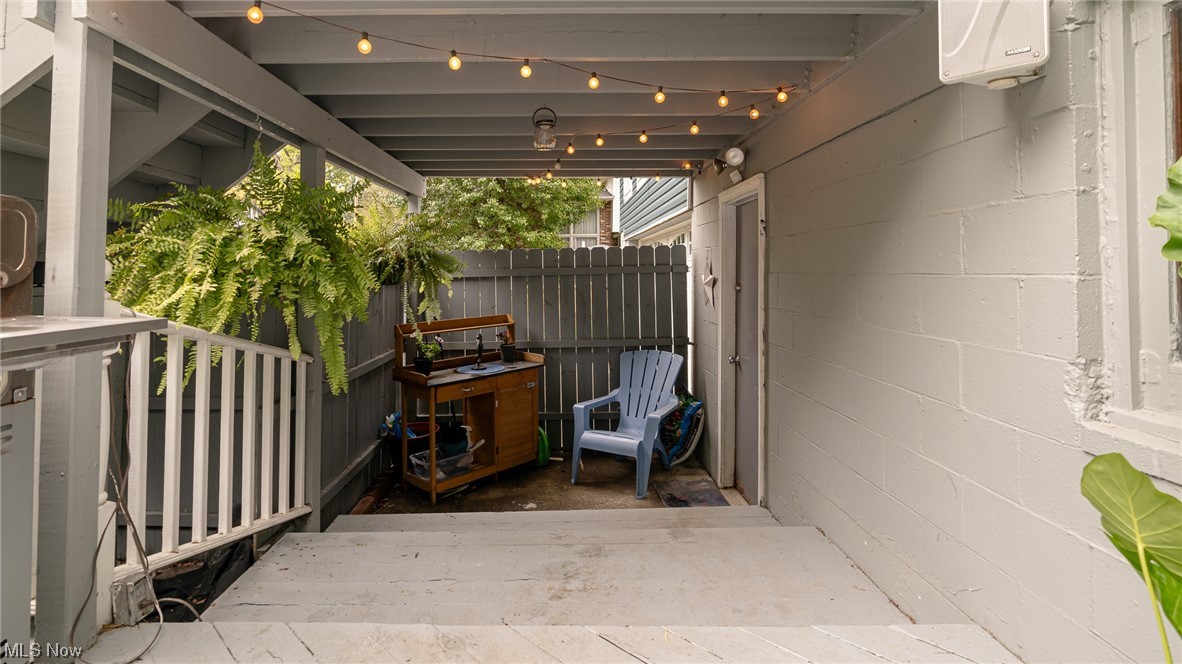 301 Perry Drive Northwest Canton, OH 44708 - Photo 12 of 34 View of patio with man door to garage