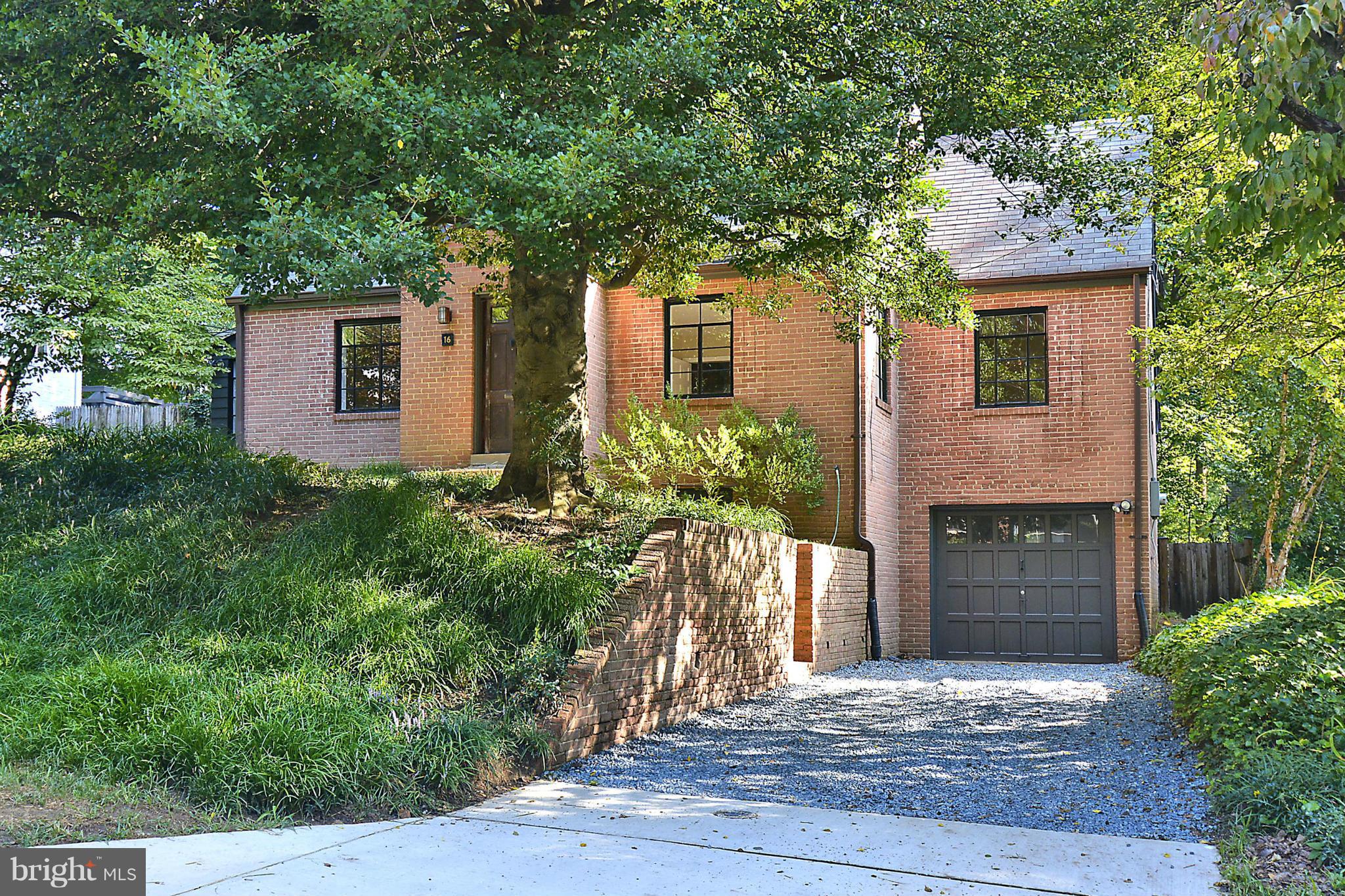16 Sussex Road Silver Spring, MD 20910 - Photo 22 of 25 a front view of a house with a garden