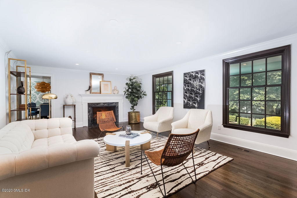14 Dingletown Road Greenwich, CT 06830 - Photo 11 of 56 a living room with furniture large window and fireplace