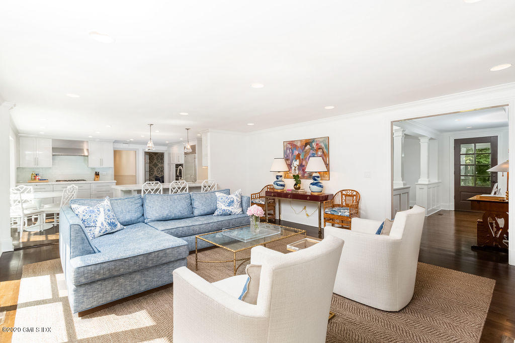 14 Dingletown Road Greenwich, CT 06830 - Photo 15 of 56 a living room with furniture and a table