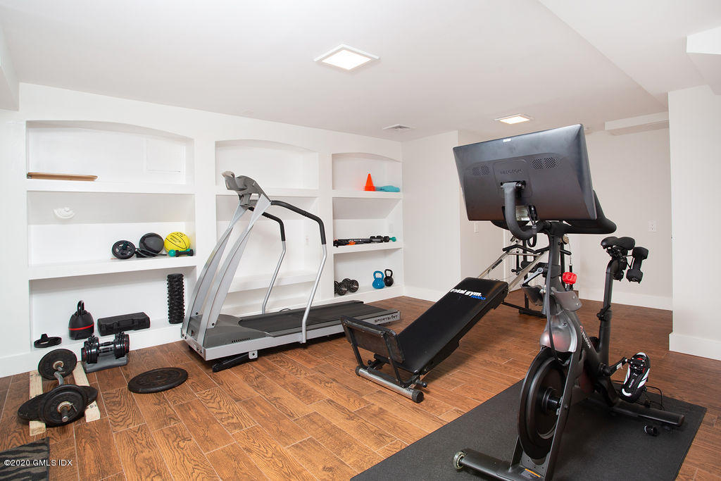 14 Dingletown Road Greenwich, CT 06830 - Photo 43 of 56 a view of a room with gym equipment