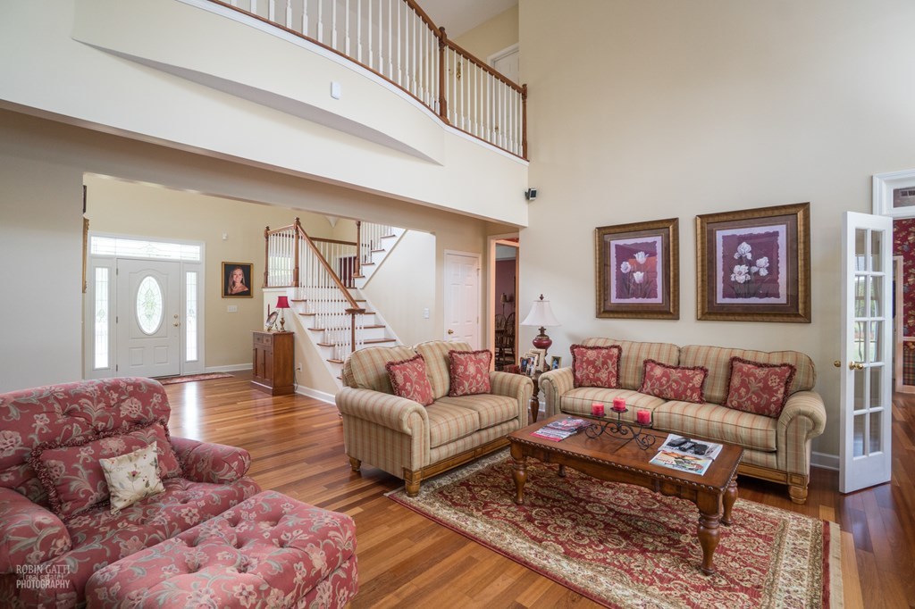 130 Orchard Ridge Drive Forsyth, GA 31029 - Photo 13 of 24 a living room with furniture and a rug