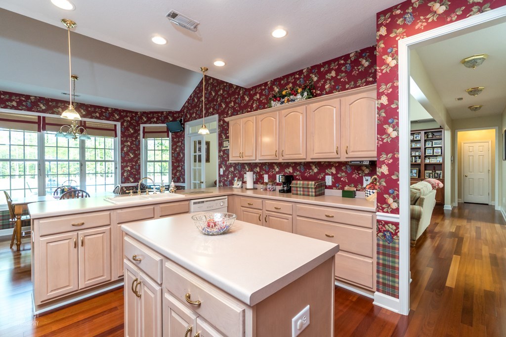 130 Orchard Ridge Drive Forsyth, GA 31029 - Photo 8 of 24 a kitchen with a sink stove and cabinets