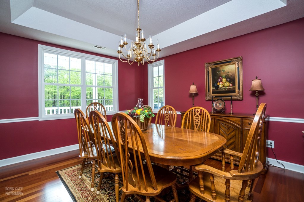 130 Orchard Ridge Drive Forsyth, GA 31029 - Photo 9 of 24 a view of a dining room with furniture window and wooden floor