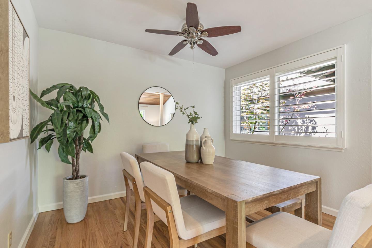 824 Buchser Way San Jose, CA 95125 - Photo 22 of 50 a view of a dining room with furniture window and wooden floor