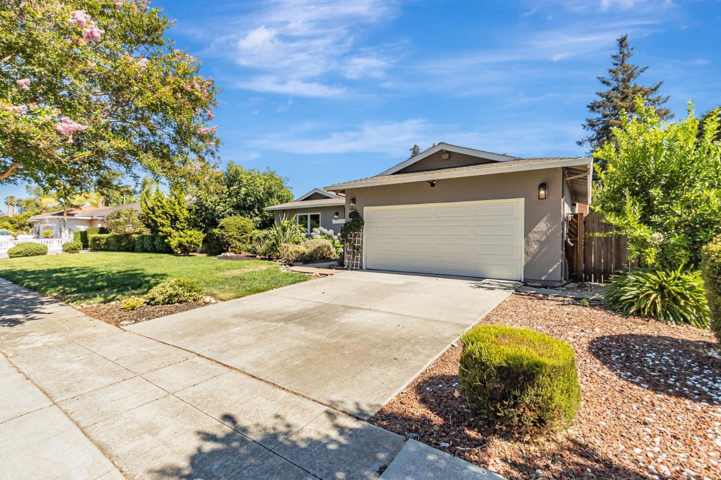 824 Buchser Way San Jose, CA 95125 - Photo 3 of 50 a front view of a house with a yard and garage
